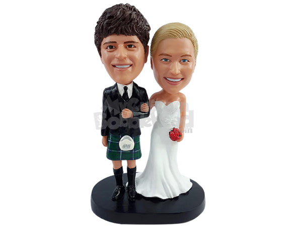 Custom Bobblehead Happy couple with the groom on a Classic Scotish garment and bride with a nice dress and flower bouquet - Wedding & Couples Couple Personalized Bobblehead & Action Figure Custom Bobblehead Happy couple with the groom on a Classic Scotish garment and bride with a nice dress and flower bouquet - Wedding & Couples Couple Personalized Bobblehead & Action Figure